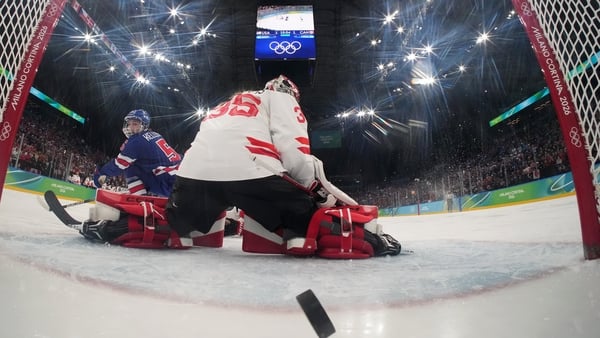 Megan Keller #5 of Team United States scores the game-winning goal past Ann-Renee Desbiens #35 of Team Canada in the overtime to win the gold medal during the Women's Gold Medal match between the United States and Canada on day 13 of the Milano Cortina 20