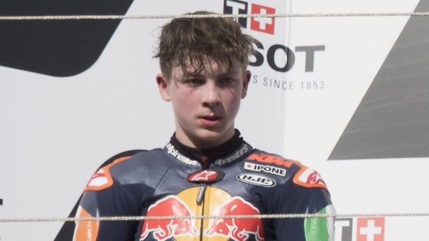 LAGOA, ALGARVE, PORTUGAL - APRIL 23: (L-R) Casey O'GORMAN of Ireland, José Rueda of Spain and Collin Vejer of Netherlands celebrate on the podium at the end of the race 1 of Rookies Cup during the MotoGP Of Portugal - Qualifying at Autodromo do Algarve on April 23, 2022 in Lagoa, Algarve, Portugal. 