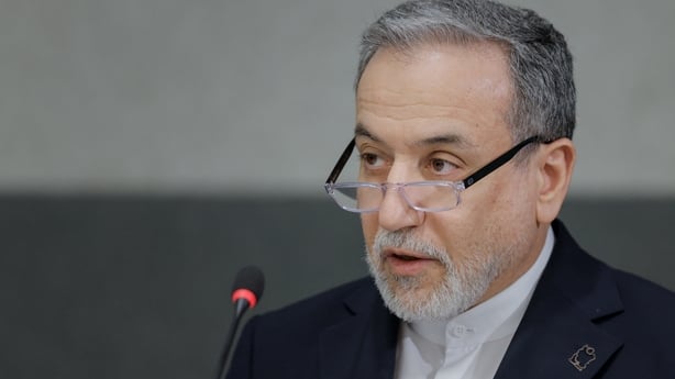 ran's Foreign Minister Abbas Araghchi delivers a speech during a session of the United Nations Conference on Disarmament, on the sideline of a second round of US-Iranian talks with Washington pushing Tehran to make a deal to limit its nuclear programme, in Geneva, on February 17, 2026. (Photo by Val