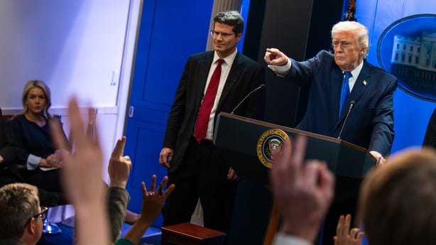 US President Donald Trump, right, and John Sauer, US solicitor general, left, during a news conference in the James S. Brady Press Briefing Room of the White House in Washington, DC, US, on Friday, Feb. 20, 2026. Trump delivered a broadside against Supreme Court justices after they struck down the b