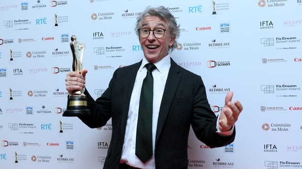 Steve Coogan accepts the "Best Lead Actor" award on behalf of his co-star Eanna Hardwicke at the 2026 Irish Film & Television (IFTA) Awards