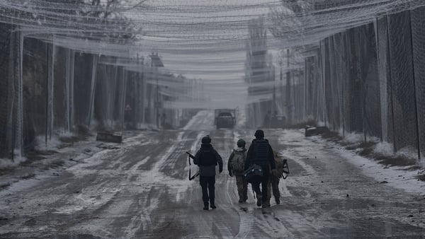 KOSTYANTYNIVKA FRONTLINE, UKRAINE - FEBRUARY 13: Protective nets above a road between Druzhkivka and Kostyantynivka as mobile fire groups patrol the area to intercept and shoot down Russian FPV drones targeting military and civilian transport along this f