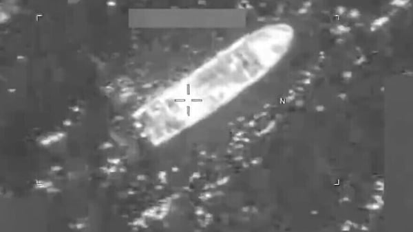 a black and white overhead shot of a vessel in water