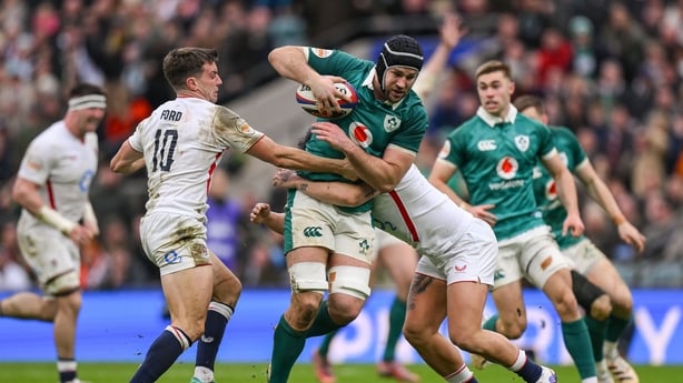 21 February 2026; Caelan Doris of Ireland is tackled by England players George Ford, left, and Marcus Smith during the Guinness 6 Nations Rugby Championship match between England and Ireland at the Allianz Stadium in Twickenham, England. Photo by Brendan Moran/Sportsfile