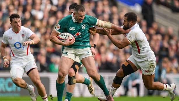 21 February 2026; Stuart McCloskey of Ireland holds of the tackle of England's Ollie Lawrence during the Guinness 6 Nations Rugby Championship match between England and Ireland at the Allianz Stadium in Twickenham, England. Photo by Brendan Moran/Sportsfile