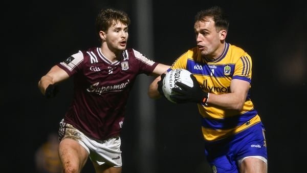 21 February 2026; Enda Smith of Roscommon is tackled by Cian Hernon of Galway during the Allianz Football League Division 1 match between Galway and Roscommon at Pearse Stadium in Galway. Photo by Ben McShane/Sportsfile