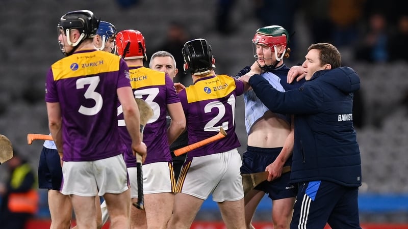 21 February 2026; Dublin manager Niall Ó Ceallacháin steps in between Diarmaid Ó Dúlaing of Dublin and Cian Byrne of Wexford following the Allianz Hurling League Division 1B match between Dublin and Wexford at Croke Park in Dublin. Photo by Stephen McCart