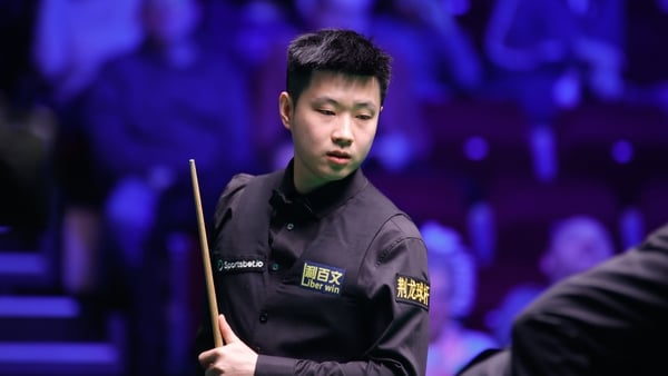 TELFORD, ENGLAND - FEBRUARY 18: Zhao Xintong of China reacts in the first round match against Elliot Slessor of England on day 2 of 2026 Players Championship at Telford International Centre on February 18, 2026 in Telford, England. (Photo by Tai Chengzhe/