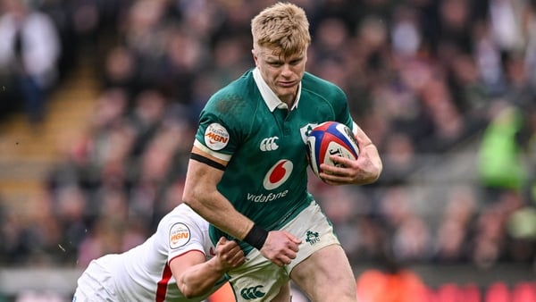 21 February 2026; Tommy O'Brien of Ireland is tackled by Marcus Smith of England during the Guinness 6 Nations Rugby Championship match between England and Ireland at the Allianz Stadium in Twickenham, England. Photo by Ramsey Cardy/Sportsfile