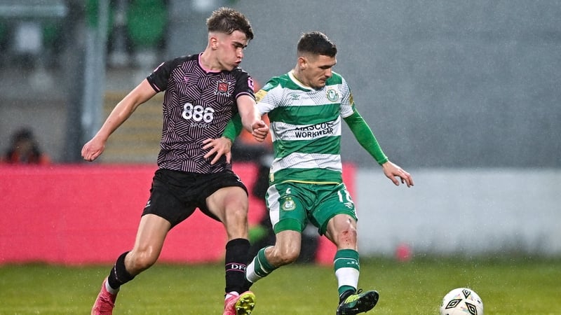 4 July 2024; Trevor Clarke of Shamrock Rovers in action against Eoin Kenny of Dundalk during the SSE Airtricity Men's Premier Division match between Shamrock Rovers and Dundalk at Tallaght Stadium in Dublin. Photo by Seb Daly/Sportsfile