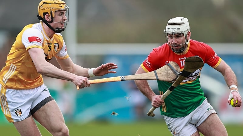 22 February 2026; Chris Nolan of Carlow in action against Niall O'Connor of Antrim during the Allianz Hurling League Division 1A match between Antrim and Carlow at Corrigan Park in Belfast. Photo by Thomas Flinkow/Sportsfile