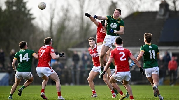 22 February 2026; Jack Flynn of Meath in action against Colm O'Callaghan of Cork during the Allianz Football League Division 2 match between Cork and Meath at Páirc Ui Rinn in Cork. Photo by Seb Daly/Sportsfile