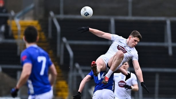 22 February 2026; Brendan Gibbons of Kildare and Patrick Lynch of Cavan contest a high ball during the Allianz Football League Division 2 match between Cavan and Kildare at Kingspan Breffni in Cavan. Photo by Tyler Miller/Sportsfile