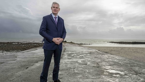 Senator Seán Kyne standing on beach at Salthill