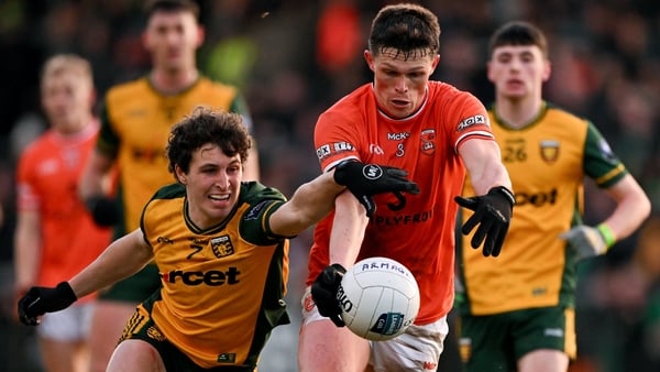 Armagh , United Kingdom - 22 February 2026; Callum O’Neill of Armagh is tackled by Finnbarr Roarty of Donegal during the Allianz Football League Division 1 match between Armagh and Donegal at BOX-IT Athletic Grounds in Armagh. (Photo By Ramsey Cardy/Sport
