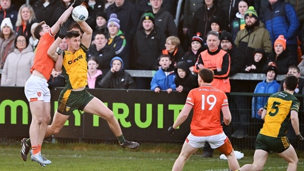 Armagh , United Kingdom - 22 February 2026; Jarly Óg Burns of Armagh in action against Jason McGee of Donegal during the Allianz Football League Division 1 match between Armagh and Donegal at BOX-IT Athletic Grounds in Armagh. (Photo By Ramsey Cardy/Sportsfile via Getty Images)