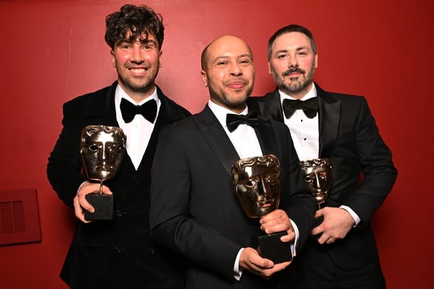 LONDON, ENGLAND - FEBRUARY 22: (L-R) Ben Jackson, Dean Atta and Baz Sells pose backstage with the British Short Animation Award for 'Two Black Boys in Paradise' during the EE BAFTA Film Awards 2026 at The Royal Festival Hall on February 22, 2026 in London, England. (Photo by Kate Green/BAFTA/Getty I