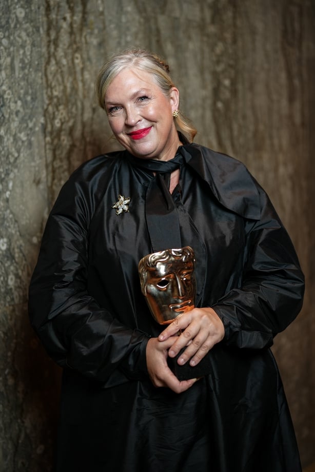 LONDON, ENGLAND - FEBRUARY 22: Kate Hawley, winner of the Costume Design Award for 'Frankenstein', poses backstage during the EE BAFTA Film Awards 2026 at The Royal Festival Hall on February 22, 2026 in London, England. (Photo by Scott Garfitt/BAFTA via Getty Images)