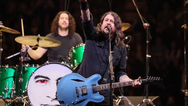 Dave Grohl points towards the crowd while performing onstage during a Foo Fighters benefit concert at KIA Forum on Wednesday, Jan. 14, 2026 in Inglewood, CA.