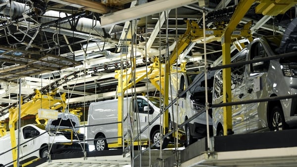 Vans on the production line in a Renault factory