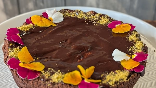 A chocolate cake decorated with flowers