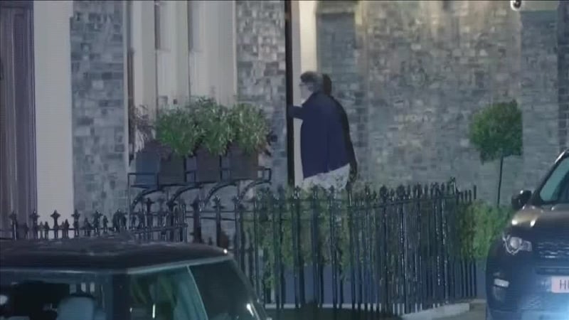 Peter Mandelson at his house after being released on bail