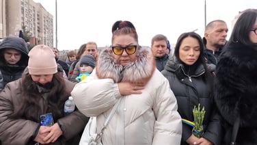 Kyiv residents hold moment of silence on fourth anniversary of Russian invasion
