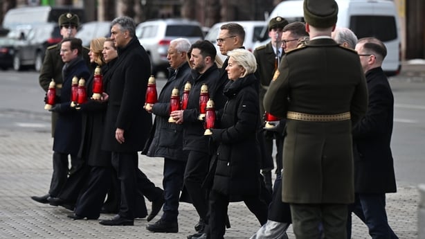KYIV, UKRAINE - FEBRUARY 24: Ukrainian President Volodymyr Zelensky with First Lady Olena Zelenska and foreign leaders place candles at the People's Memorial of National Remembrance during the ceremony to commemorate the fourth anniversary of Russia's full-scale invasion of Ukraine in Independence S