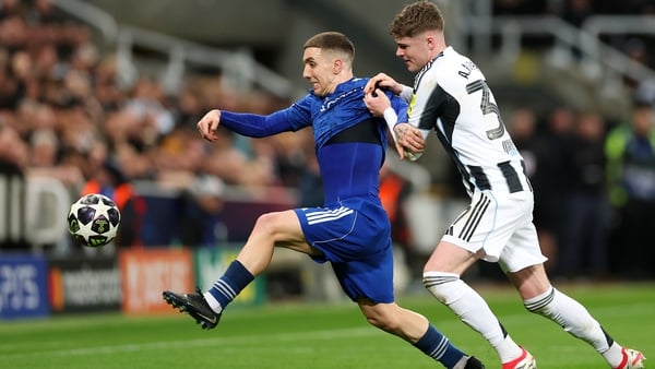 Alex Murphy of Newcastle United (r) in action against Jonathan Montiel Qarabag in Champions League play-off round, February 2026