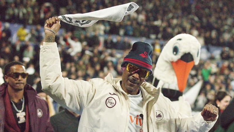 Swansea City AFC club co-owner Snoop Dogg walks around the pitch prior to the Sky Bet Championship match between Swansea City and Preston North End