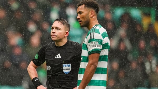 GLASGOW, SCOTLAND - FEBRUARY 22: Celtic's Auston Trusty (R) and Referee Matthew MacDermid before Trusty is sent off following an altercation with Hibernian's Jamie McGrath during a William Hill Premiership match between Celtic and Hibernian at Celtic Park