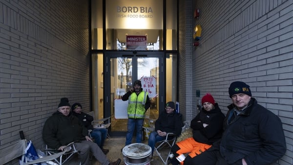 Members of the Irish Farmers Association sit outisde the Bord Bia HQ as part of a protest.