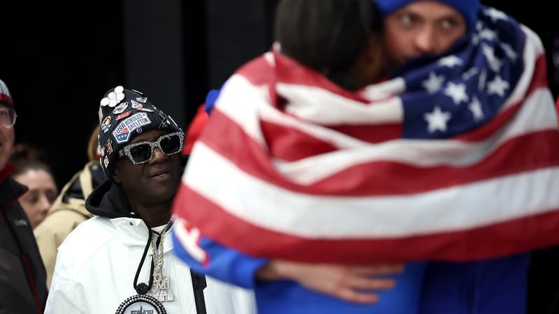 Flavor Flav looks on as he watches the Women's Monobob Bobsleigh Heat 4 on day ten of the Milano Cortina 2026 Winter Olympic games at Cortina Sliding Centre on February 16, 2026 in Cortina d'Ampezzo, Italy. (Photo by Julian Finney/Getty Images)