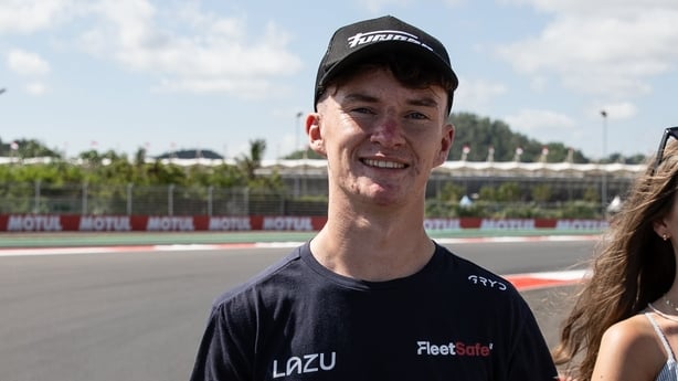 LOMBOK, INDONESIA - OCTOBER 02: Eddie O'Shea of United Kingdom and FleetSafe Honda - MLav Racing walks during Riders Track Familiarisation ahead of the MotoGP of Indonesia at Pertamina Mandalika Circuit on October 02, 2025 in Lombok, Indonesia. (Photo by Robertus Pudyanto/Getty Images)