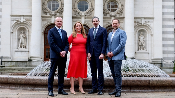 Picture of a group of business people in front of a fountain