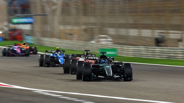 George Russell of Great Britain driving the (63) Mercedes AMG Petronas F1 Team W17 leads Charles Leclerc of Monaco driving the (16) Scuderia Ferrari SF-26 and Carlos Sainz of Spain driving the (55) Williams FW48 Mercedes as they practice their race start procedures during day three of F1 Testing at 