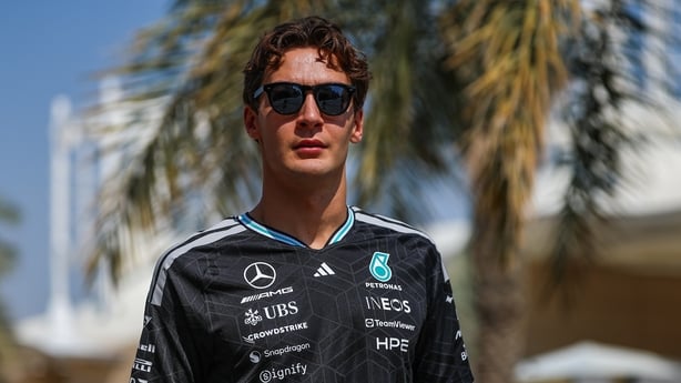 George Russell of Great Britain and Mercedes AMG Petronas walks in the paddock during day three of F1 Testing at Bahrain International Circuit on February 20, 2026 in Bahrain, Bahrain.