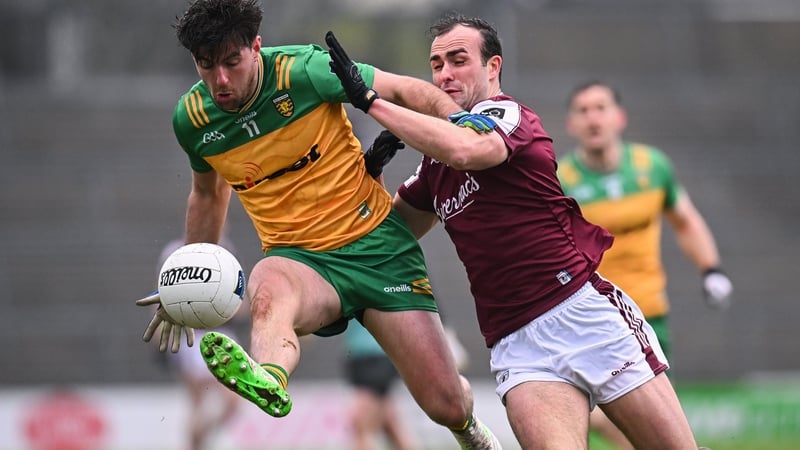 Donegal's Dáire Ó Baoill gets away from the challenge from John Maher of Galway in last year's Division 1 meeting between the sides