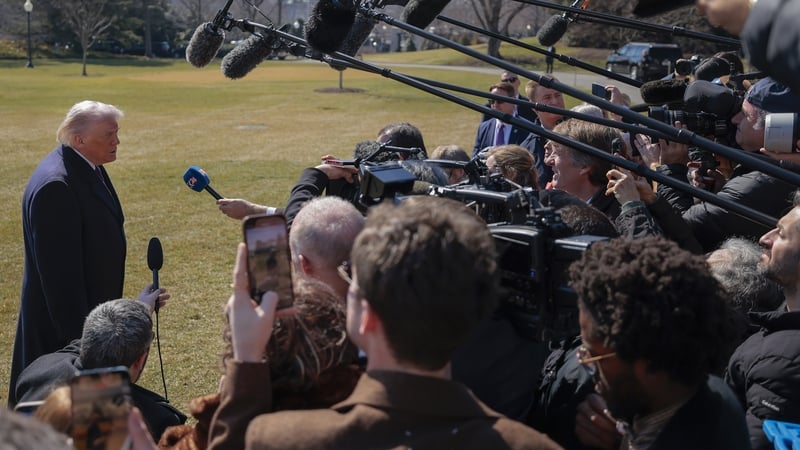 US President Donald Trump stops to speak to the media as he departs on Marine One on the South Lawn of the White House on February 27, 2026 in Washington, DC