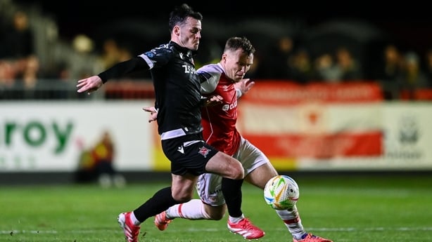 Danny Mullen of Dundalk in action against Jamie Lennon of St Patrick's Athletic