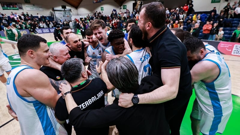 27 February 2026; Azerbaijan players and staff celebrate after their victory in the FIBA EuroBasket 2029 Pre-Qualifiers Group A match between Ireland and Azerbaijan at the National Basketball Arena in Dublin. Photo by Thomas Flinkow/Sportsfile