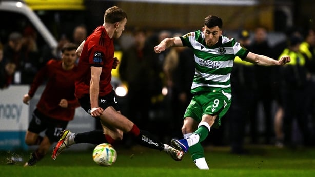 27 February 2026; Aaron Greene of Shamrock Rovers shoots to score his side's second goal during the SSE Airtricity Men's Premier Division match between Bohemians and Shamrock Rovers at Dalymount Park in Dublin. Photo by Seb Daly/Sportsfile