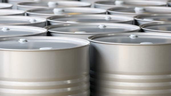 Close up image of several silver coloured barrels