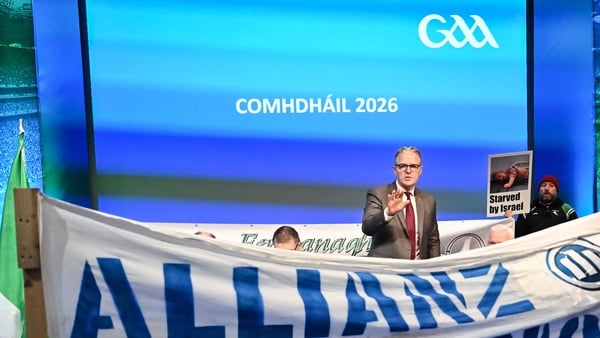 Uachtarán Chumann Lúthchleas Gael Jarlath Burns talking to anti Allianz protesters who gained access to the Congress floor during motions, before Congress was suspended for a time, during day two of the GAA Annual Congress at Croke Park in Dublin.