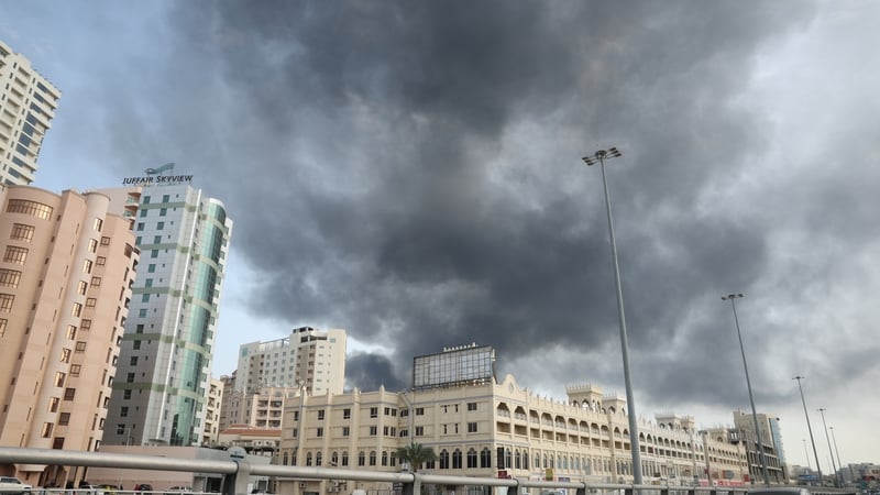 Smoke rises after Iran launched a missile attack targeting the headquarters of the US Navyâs Fifth Fleet in Manama