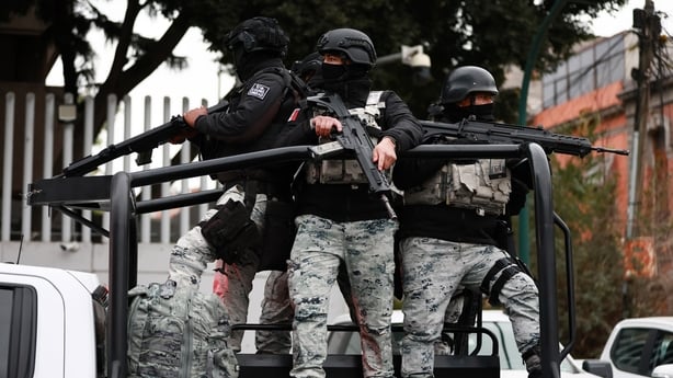 Members of the National Guard stand guard outside the facilities of the Specialized Prosecutor's Office for Organized Crime in Mexico City