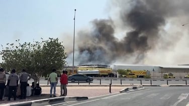 Smoke rises in Doha, Qatar after shrapnel falls on industrial area