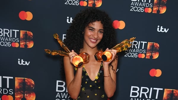 Olivia Dean poses in the winners room at The BRIT Awards 2026