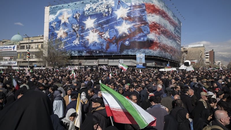 Pro-government supporters participate in a rally in Tehran, Iran