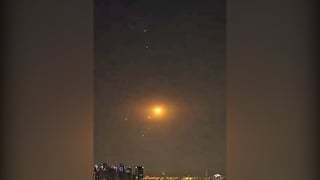 Irish residents of Doha watch as missiles are intercepted